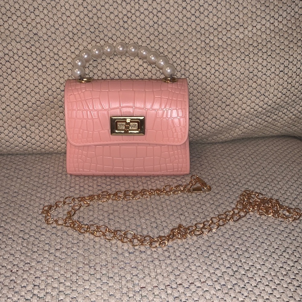 Mini pink purse with crossbody chain